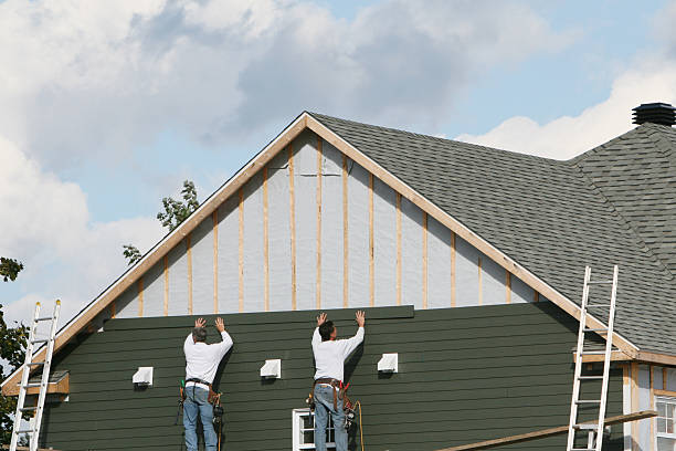 Professional Siding Installation technician working in Andover, CT